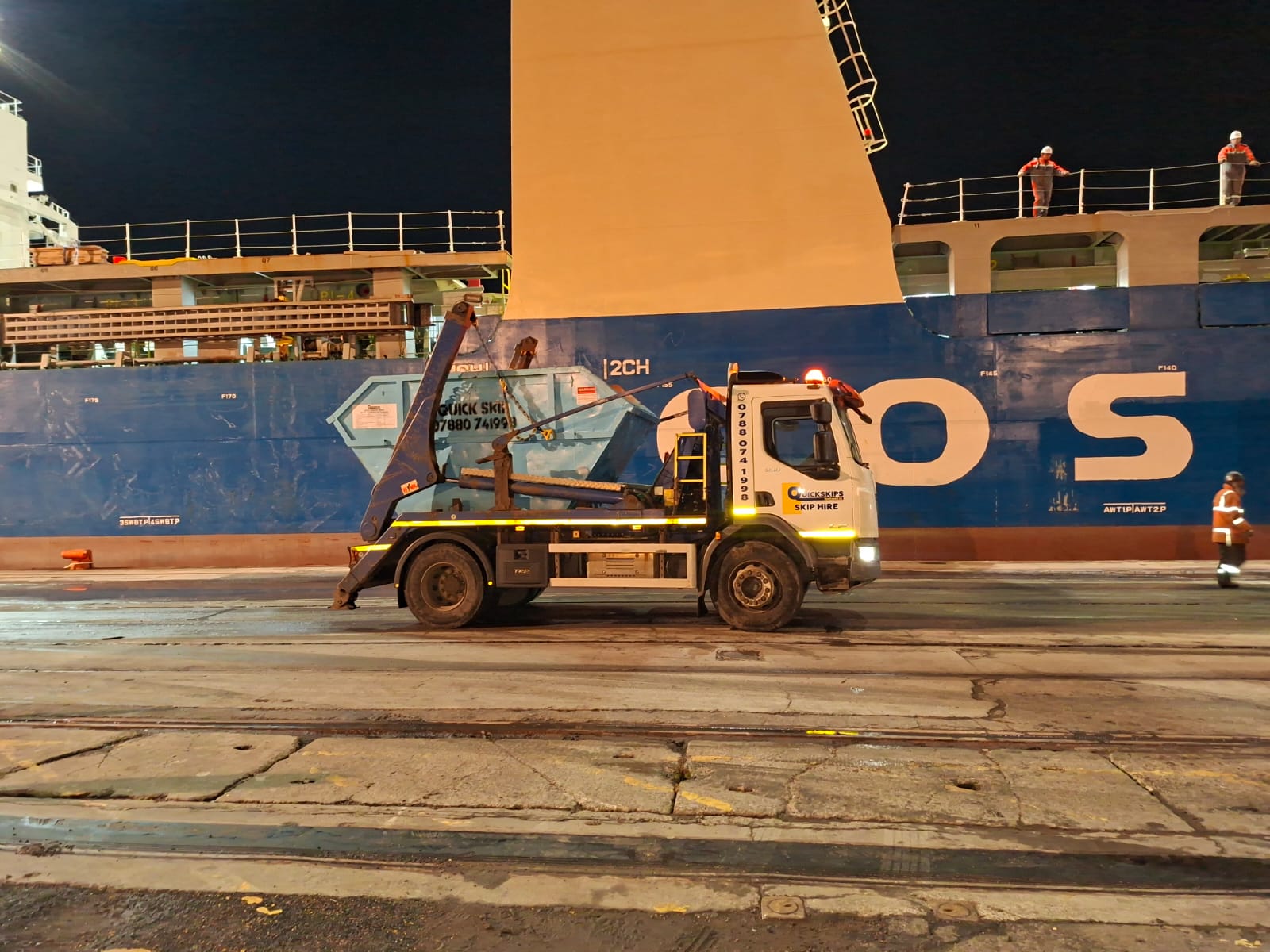 Quick Skips skip lorry working dockside